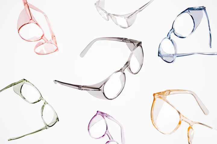 Person wearing prescription safety glasses during hands-on work.